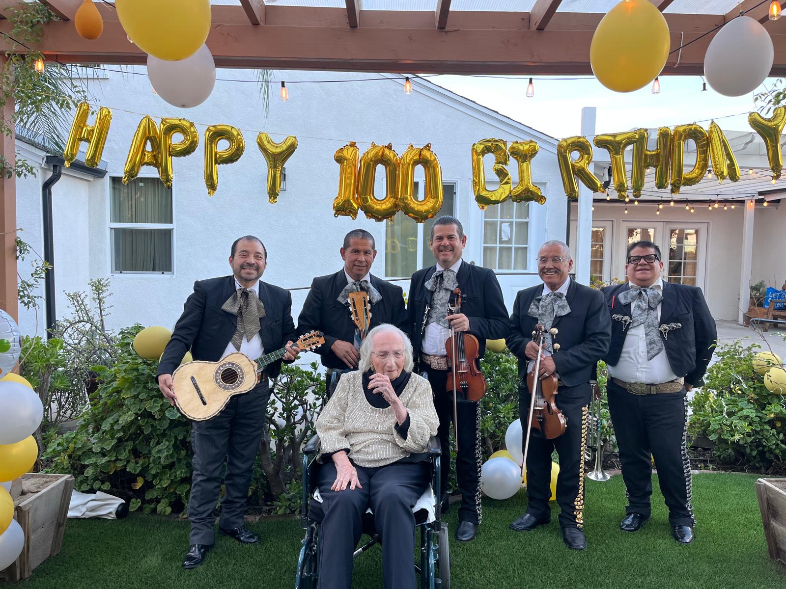 The mariachi band at a 100th birthday celebration