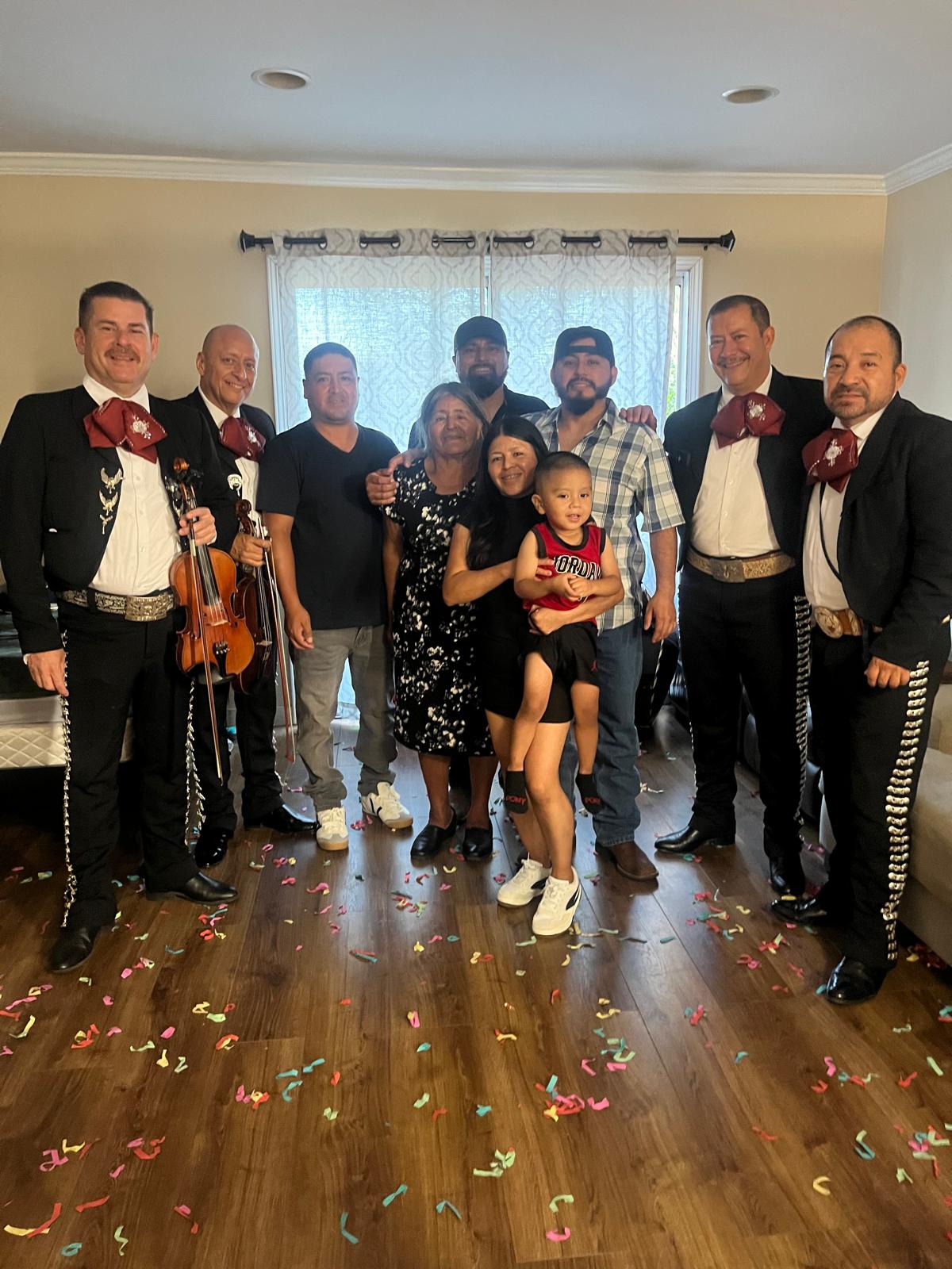 Musicians and a family together at home